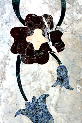 Close Up of Granite Inlay inside a Marble Fireplace Hearth